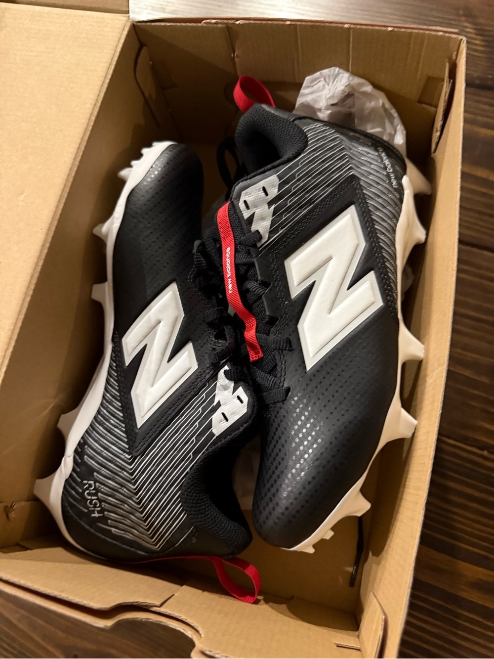 New Balance Black, White & Red  Cleats